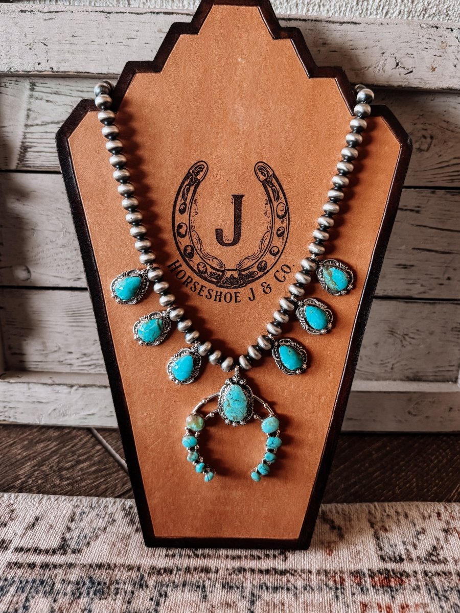 Two Stories Wide Turquoise Squash Blossom - Horseshoe J & Co.