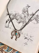 native american made turquoise naja pendant 