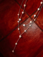 liquid silver Necklace or lariat necklace with heart-shaped pink conch beads 