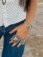 white buffalo cuff bracelet, sterling silver twist cuff bracelet, large adjustable stamped concho ring