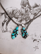native american made turquoise pendant 