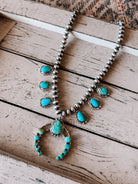 Two Stories Wide Turquoise Squash Blossom - Horseshoe J & Co.
