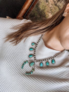 Two Stories Wide Turquoise Squash Blossom - Horseshoe J & Co.